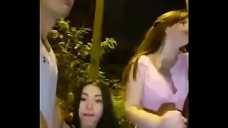 Two beautiful girls share a public mamada